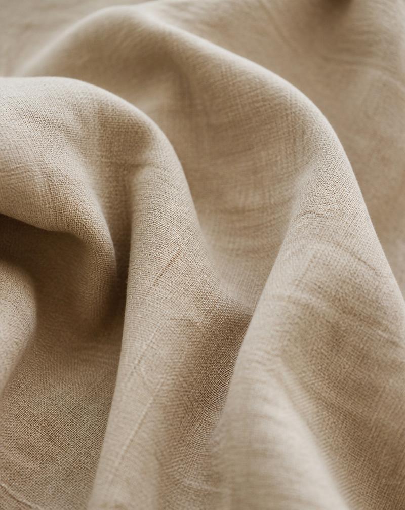 Warm linen texture representing relationship coaching
